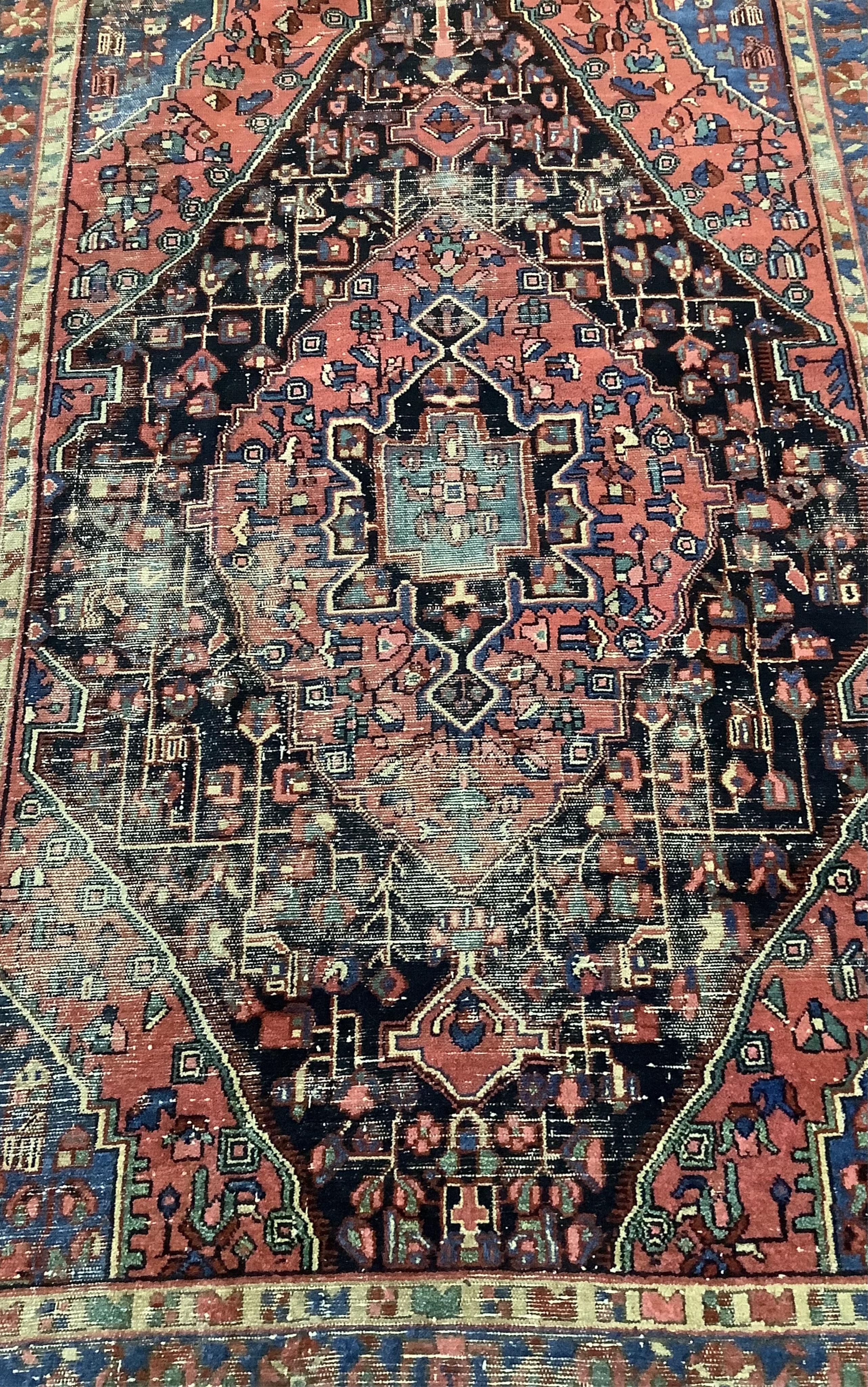 A Hamadan rug, 215 x 130cm and a Malayer rug, 190 x 125cm. Condition - poor to fair